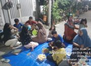 Warga RT 04 Alam Jaya Gelar Acara Bakar Ikan dan Jagung Sambut Tahun Baru 2025