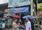 Jelang Lebaran, Polsek Jajaran Polres Boyolali Serentak Pasang MMT Imbauan Waspada Uang Palsu di Pasar