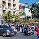 Semarak Kemerdekaan! Sat Intelkam Polres Pelabuhan Makassar Bersama Bajaj Maxim Bagikan 250 Bendera Merah Putih