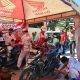Puluhan Driver Ojol di Kuningan Dapat Servis Motor dan Ganti Oli Gratis dari Polisi