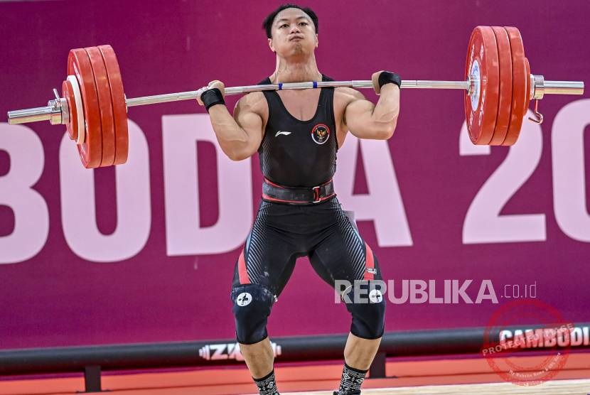 Rahmat Erwin Abdullah berlaga pada cabang angkat besi kelas 75 kg putra di Asian Games 2026 Nagoya.
