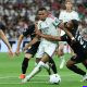 Kylian Mbappe merayakan gol hat-trick melawan Real Sociedad di Santiago Bernabeu.