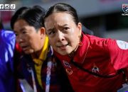 Madam Pang Buka Suara soal Brunei Gantikan Bahrain Lawan Timnas Indonesia — Ilustrasi sepak bola dengan latar stadion dan bendera Thailand serta Brunei