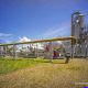 Energi Mega (ENRG) Investasi US$ 200 Juta di HighPeak Energy AS — Logo Energi Mega Persada dan teks HighPeak Energy AS terkait investasi US$ 200 juta