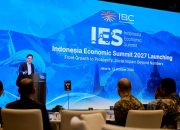 Logo Indonesia Economic Summit 2027 dengan latar biru dan teks IES 2027 Fokus Dampak Sosial Pertumbuhan Ekonomi