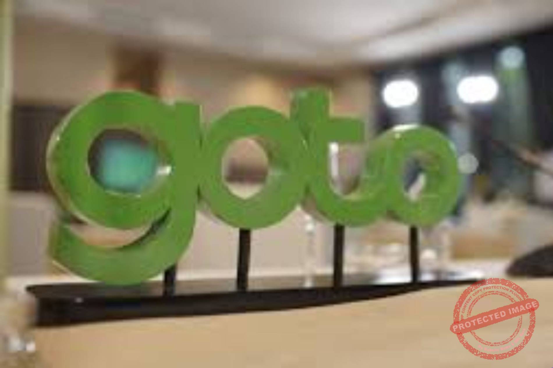 Laba bersih GOTO 3 kuartal beruntun — Logo GOTO dengan grafik pertumbuhan dan angka laba bersih Rp441 miliar kuartal III-2026